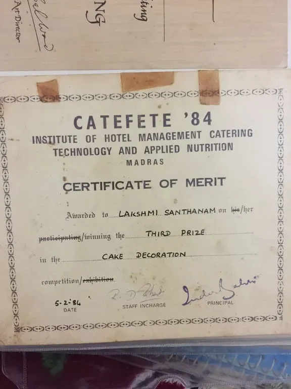 Certificate of merit from the Institute of Hotel Management Catering Technology and Applied Nutrition, Madras, awarded to Lakshmi Santhanam for third prize in cake decoration at Catefete '84