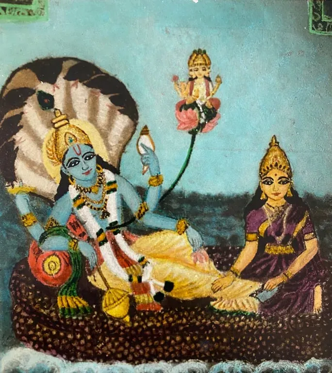 Coloured rangoli of Vishnu reclining on the serpent Adisesha with Lakshmi at his feet and Brahma on a lotus above