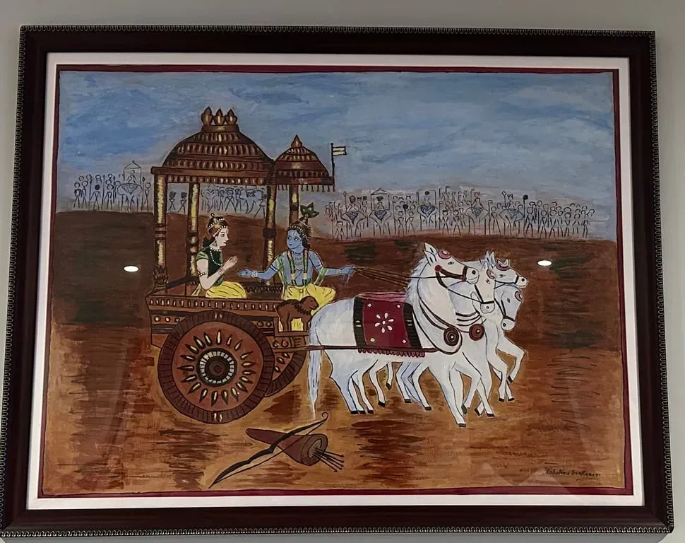 Framed painting of Krishna driving Arjuna's chariot drawn by white horses, the Geetha Upadesam scene