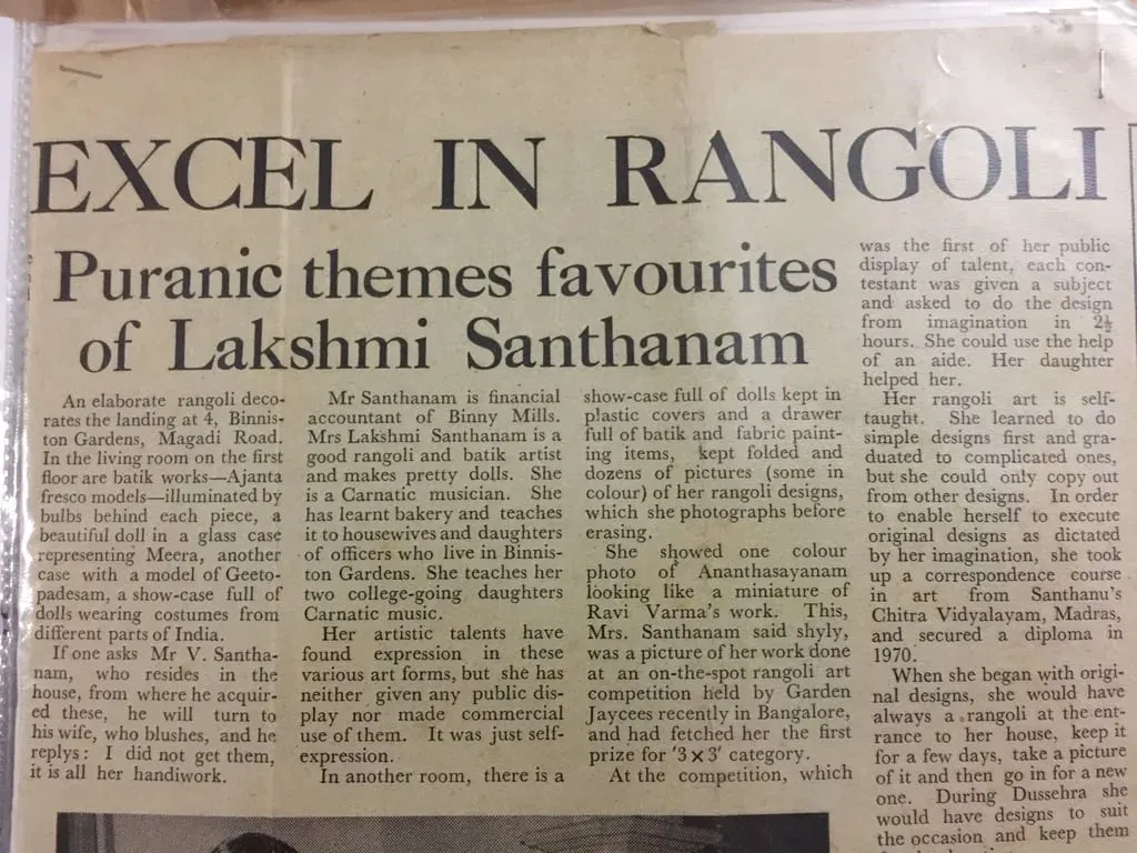 Newspaper clipping headed Excel in Rangoli: Puranic themes favourites of Lakshmi Santhanam, with a photograph of her drawing on the floor