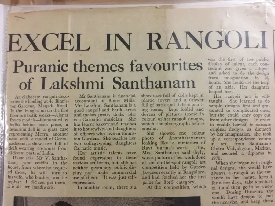 Newspaper clipping headed Excel in Rangoli, with a photograph of Lakshmi Santhanam drawing