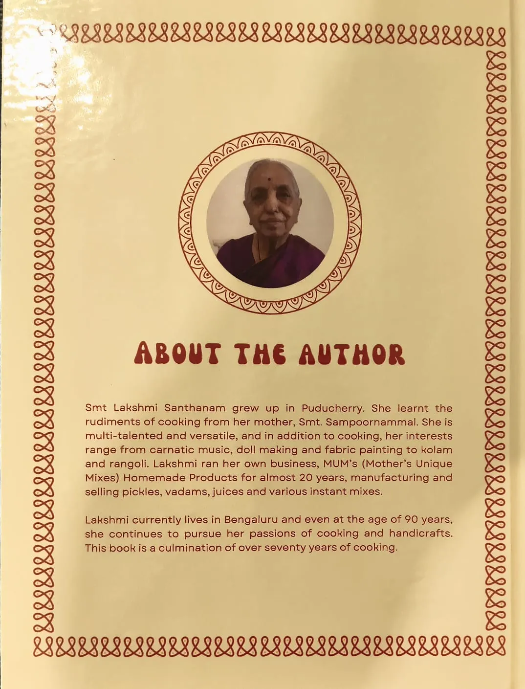 Back cover: a portrait of Lakshmi Santhanam in a purple sari inside a kolam ring, above the heading About the Author